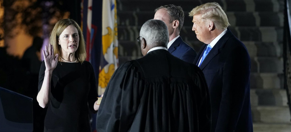 Supreme Court Justice Amy Coney Barrett is sworn in on October 22, 2020. (photo: Nikolas Kamm/AFP)