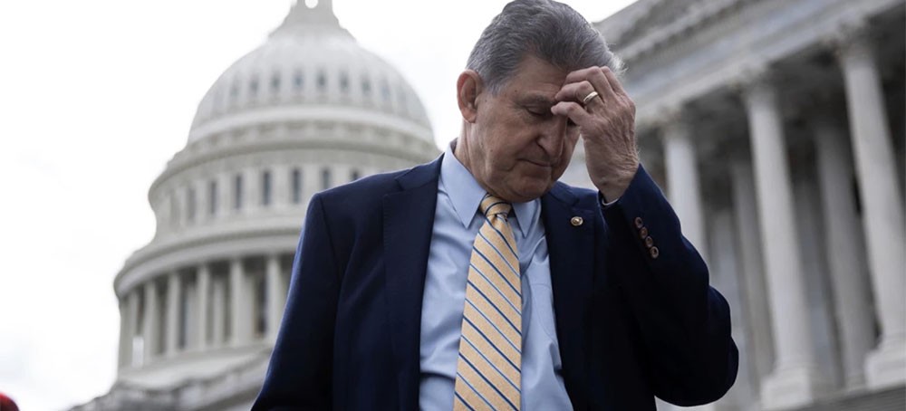 According to Manchin's colleagues, he flip-flopped on voting to reform the filibuster and voting rights. (photo: Francis Chung/EE News/POLITICO/AP Images)