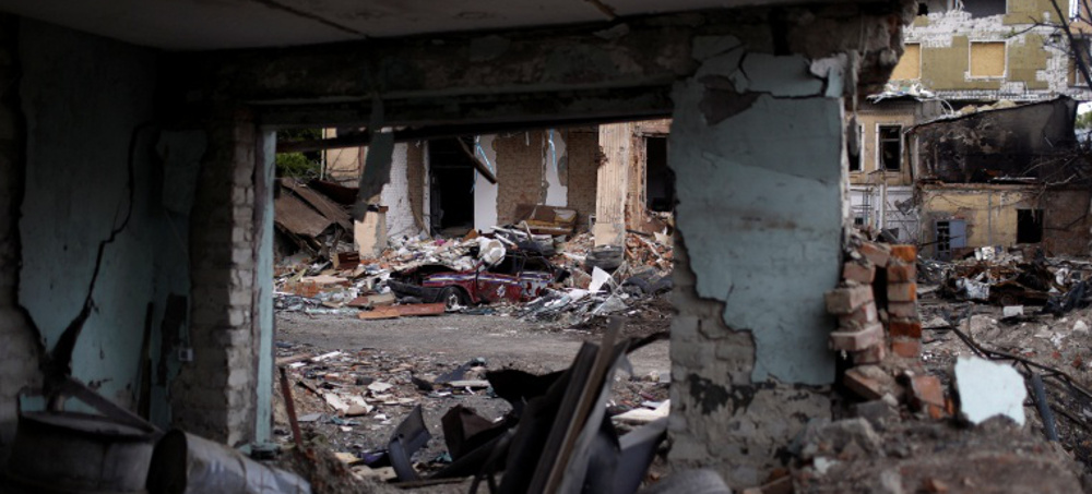 Residential area destroyed by a Russian bombing in Kharkiv, Ukraine. (photo: Ricardo Moraes/Reuters)