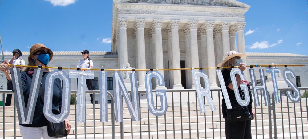 Activists rally for voting rights outside the Supreme Court on June 23, 2021. (photo: Drew Angerer/Getty)