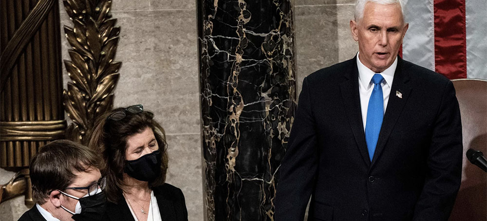 Then-Vice President Mike Pence is seen presiding over a joint session of Congress to certify the 2020 Electoral College results after a mob of pro-Trump supporters stormed the Capitol. Proposed changes to the Electoral Count Act would clarify the vice president's role in counting states' electoral votes. (photo: Erin Schaff/AFP/Getty Images)