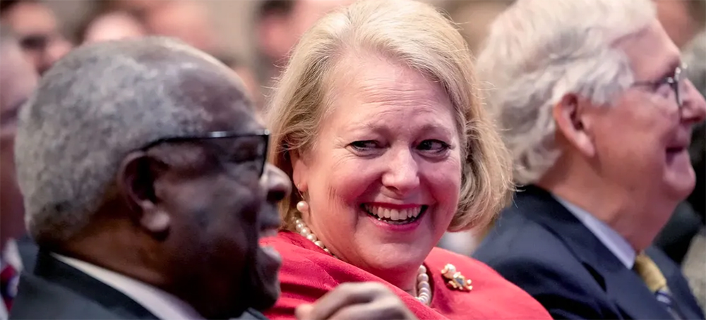 Associate Supreme Court Justice Clarence Thomas sits with his wife and conservative activist Virginia Thomas while he waits to speak at the Heritage Foundation on October 21, 2021 in Washington, DC. (photo: Drew Angerer/Getty Images)