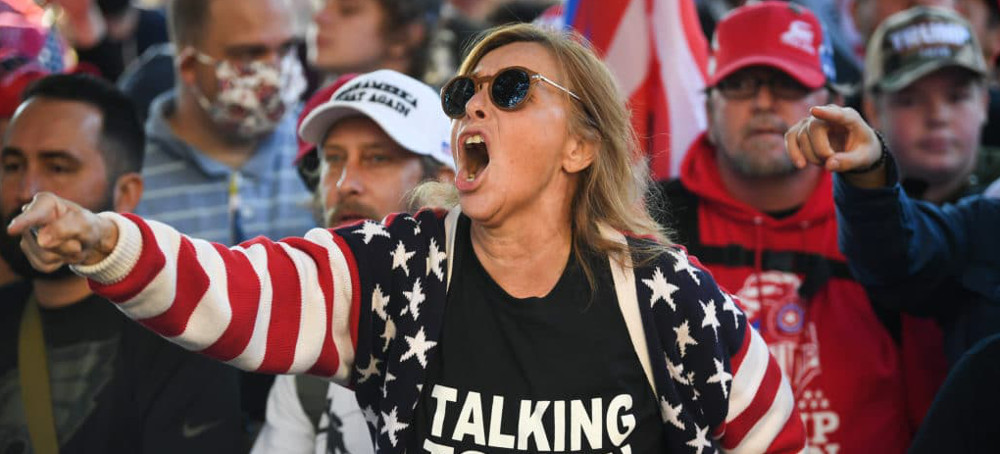 A Trump supporter yells at counter-protesters outside of the U.S. Supreme Court during the Million MAGA March in Washington on Saturday, Nov. 14, 2020. (photo: Caroline Brehman/Getty)