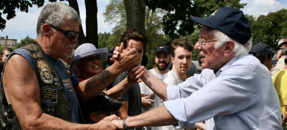 Sen. Bernie Sanders greets supporters at a rally for worker's rights in Cambridge, Sunday, August 21, 2022. (photo: Tori Bedford/GBH News)