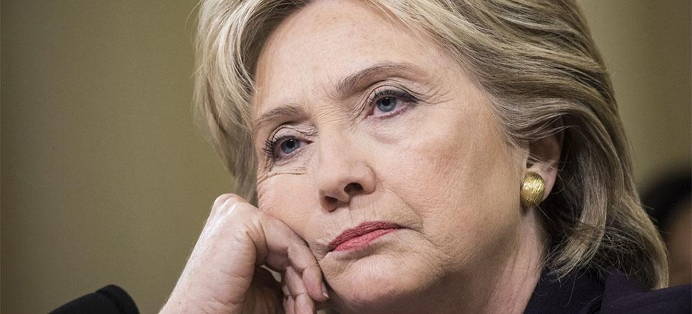 Former Secretary of State and Democratic Presidential Candidate Hillary Clinton listens to questions from committee members while testifying in front of the Benghazi Committee during a hearing on the attack in Washington, USA on October 22, 2015. (photo: Samuel Corum/Anadolu Agency/Getty Images)