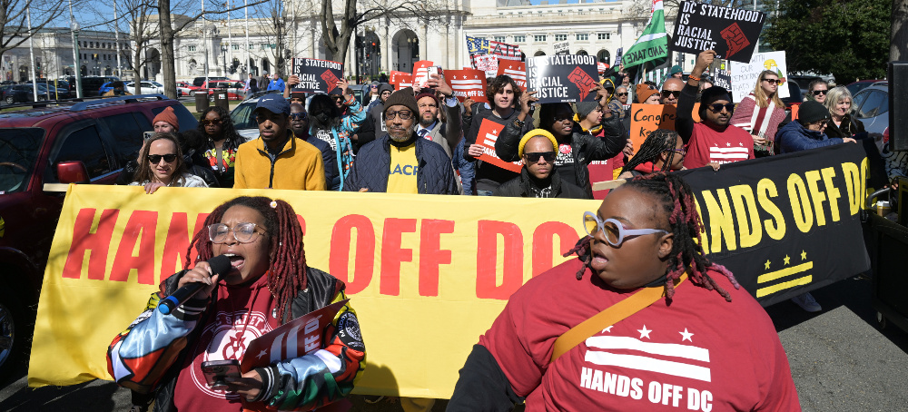 Demonstrators turn out for a Hands Off D.C. march near Union Station on Wednesday. (photo: Matt McClain/The Washington Post)