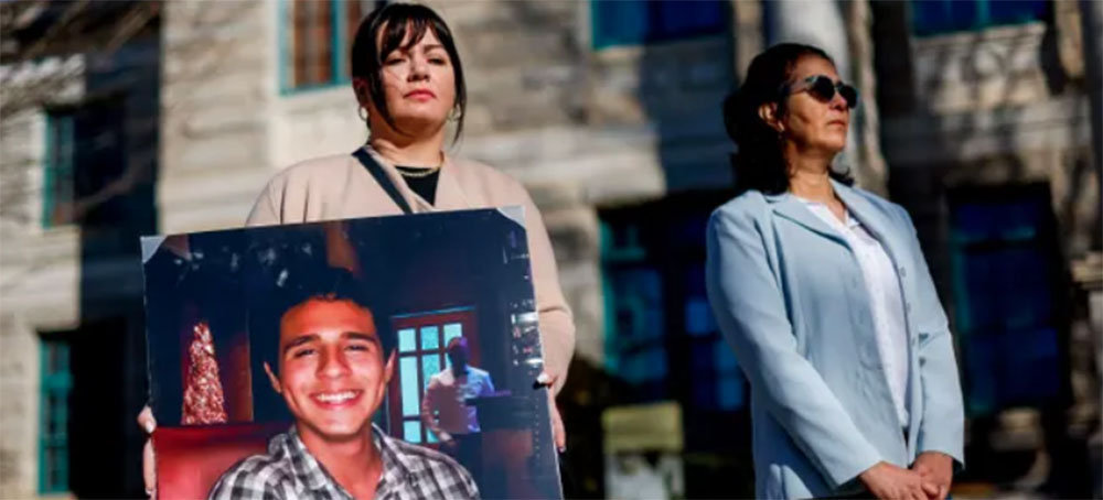 Sister-in-law Fiona Paez holds a photograph of Manuel Paez Terán, during a family news conference in Decatur, Georgia, on 6 February. (photo: Erik S Lesser/EPA)