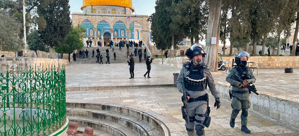 Police walk inside the Al-Aqsa mosque compound in Jerusalem, early on April 5, 2023 after clashes erupted during Islam's holy month of Ramadan. (photo: Ahmad Gharabli/AFP)