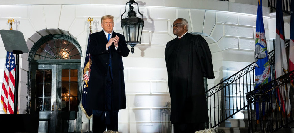 Clarence Thomas with Donald Trump at the swearing-in of Amy Coney Barrett in October 2020. (photo: The White House)
