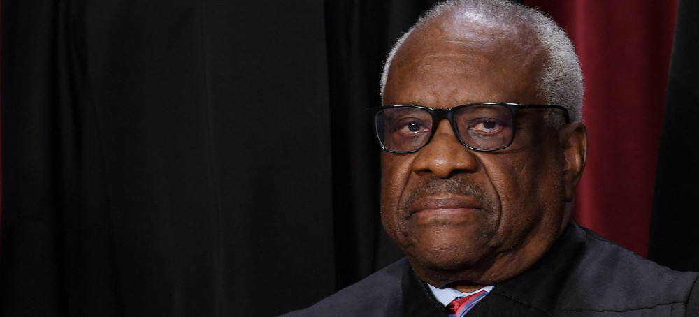 Associate US Supreme Court Justice Clarence Thomas poses for the official photo at the Supreme Court in Washington, DC on October 7, 2022. (photo: Olivier Douliery/AFP)
