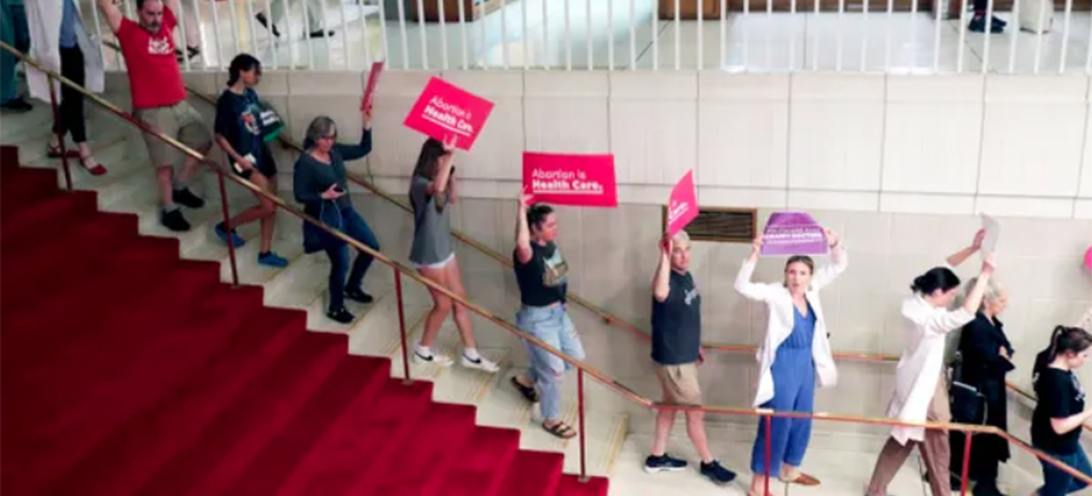 Abortion rights protesters on 16 May 2023, in Raleigh, North Carolina, after state house members voted to override the governor’s abortion-ban veto. (photo: Chris Seward/AP) 