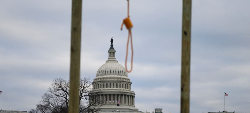 A noose is seen on makeshift gallows on January 6, 2021. (photo: Andrew Caballero-Reynolds/AFP)