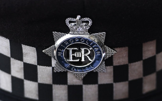A Metropolitan police badge, seen on a hat. The force has come under intense criticism since the publication of Louise Casey's report