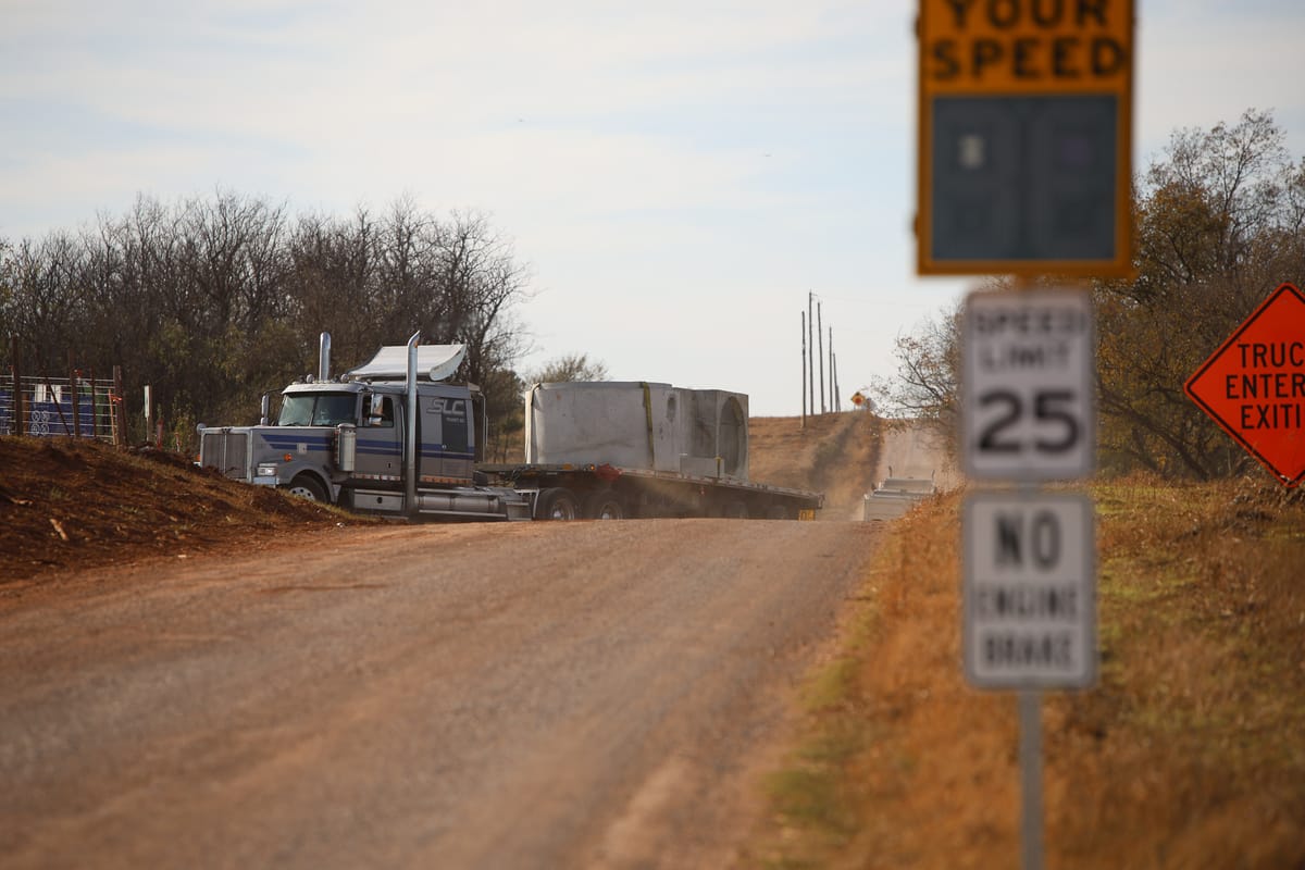 semi truck on a dirt road