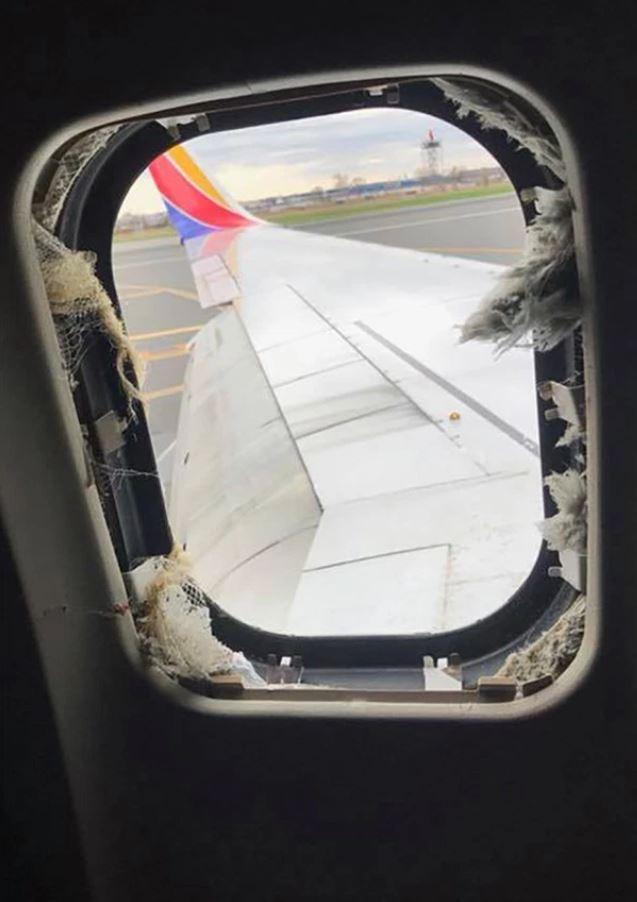  Passengers said they were injured by a piece of shrapnel which blew from the engine into the side of the plane