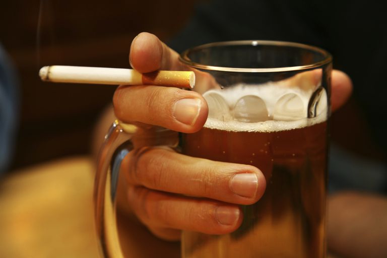 Image result for drinking a beer and smoking a cigarette