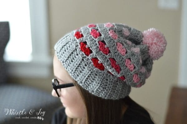 FREE Crochet Pattern | Puppy Love Heart Slouchy - Get the free crochet pattern for this sweet heart-patterned slouchy hat. 