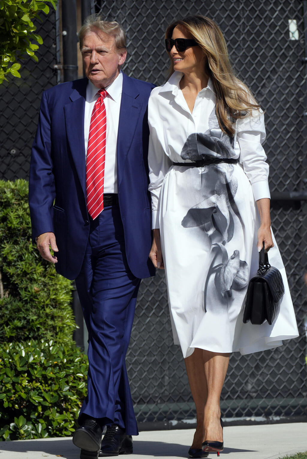 Супруги Трамп (Фото: AP Photo/Wilfredo Lee)  מלניה ודונלד טראמפ, 2024