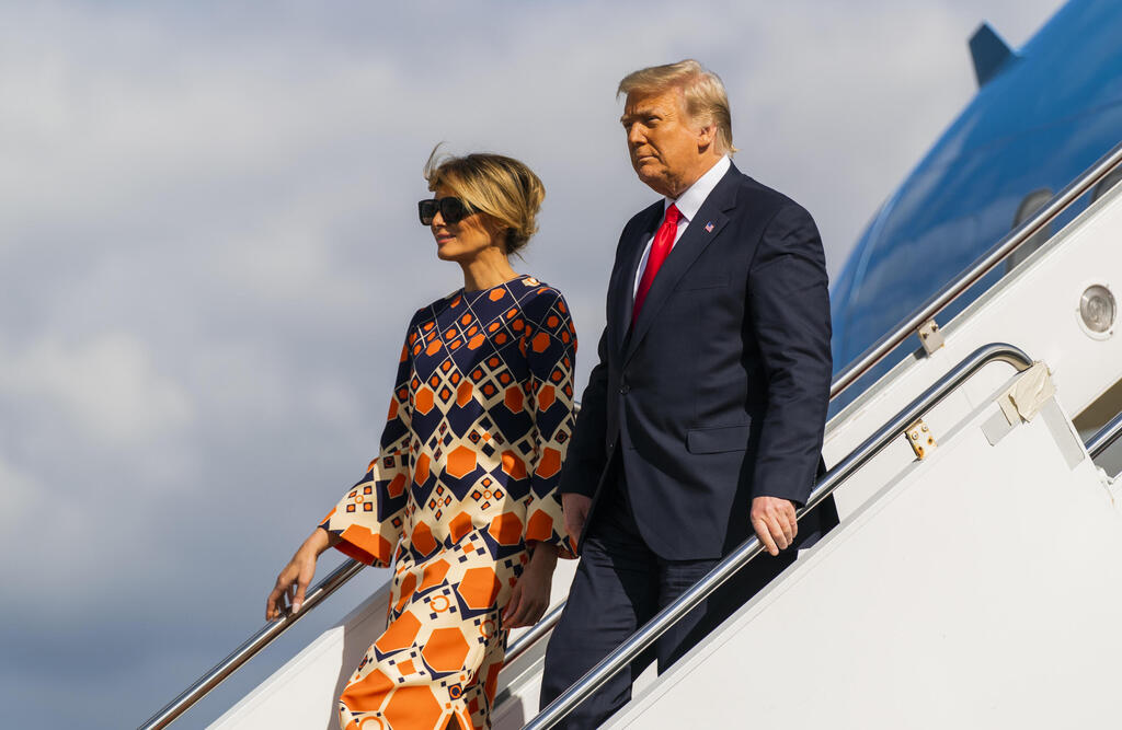 Мелания и Дональд Трамп, 2021 год (Фото: AP Photo/Manuel Balce Ceneta)  מלניה ודונלד טראמפ, 2021