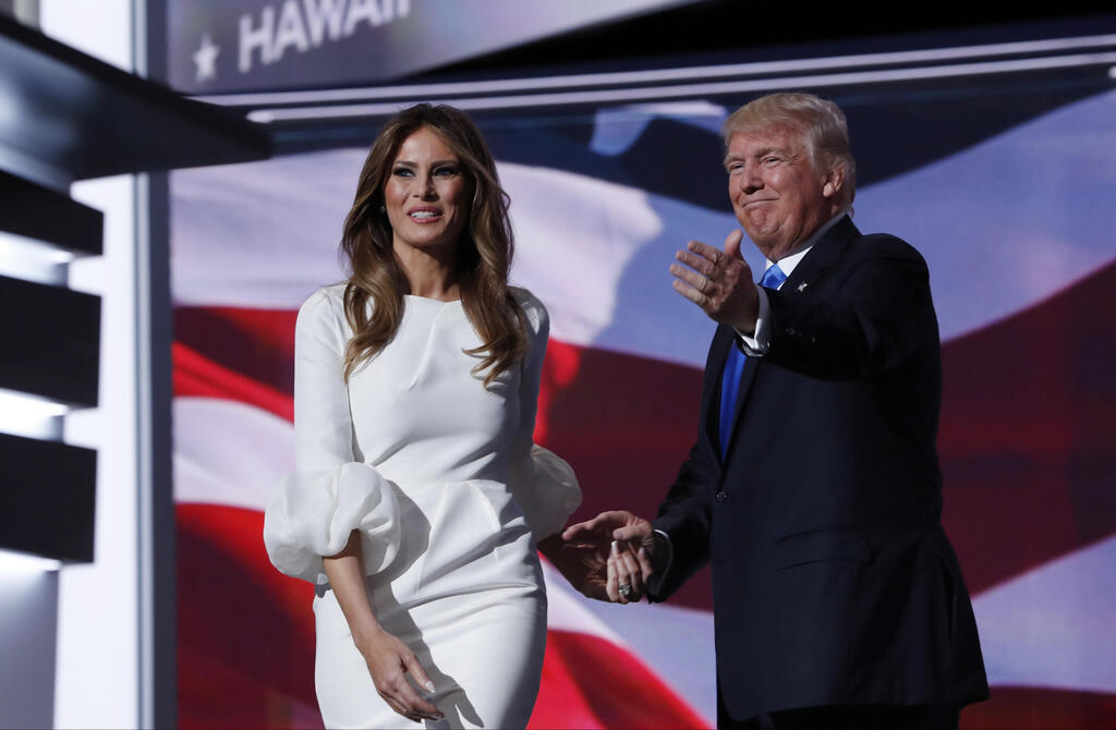 Мелания и Дональд Трамп, 2016 год (Фото: AP Photo/Carolyn Kaster)  מלניה ודונלד טראמפ בוועידה הרפובליקנית, 2016